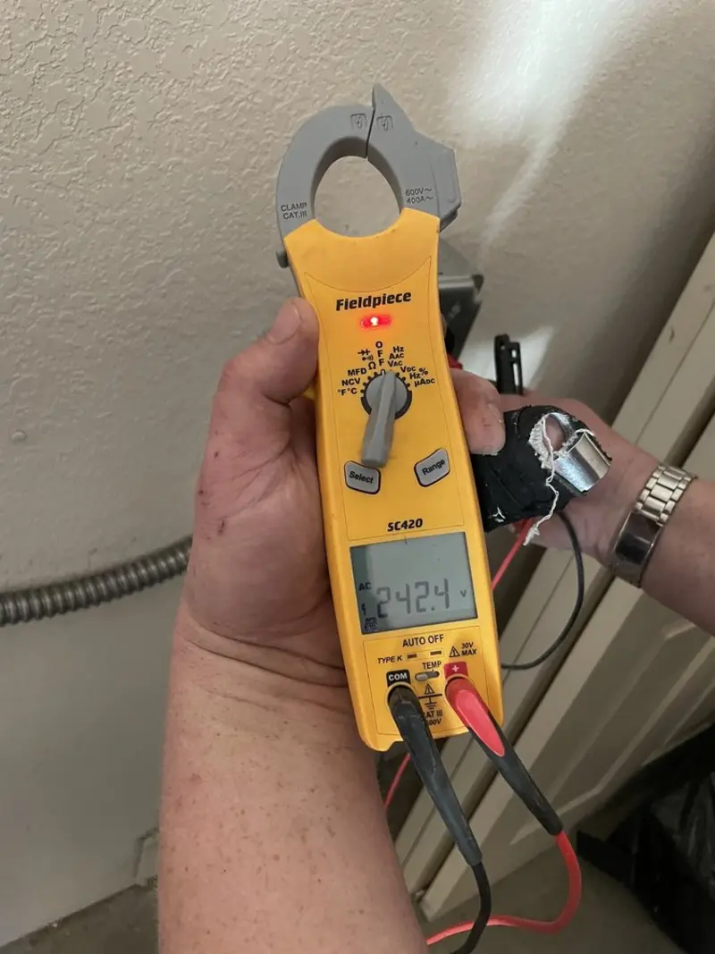Voltage testing with clamp meter during Electrical Installation Services in Port St. Joe